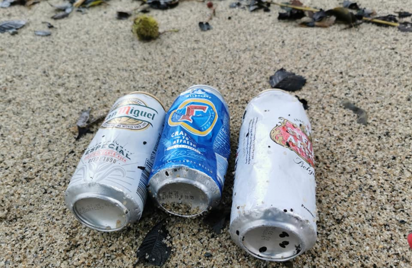 Cans on a beach